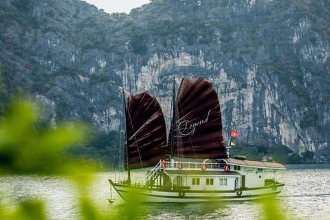 Legend Halong Private Cruises - Managed by Bhaya Cruise Docked boat in Laos