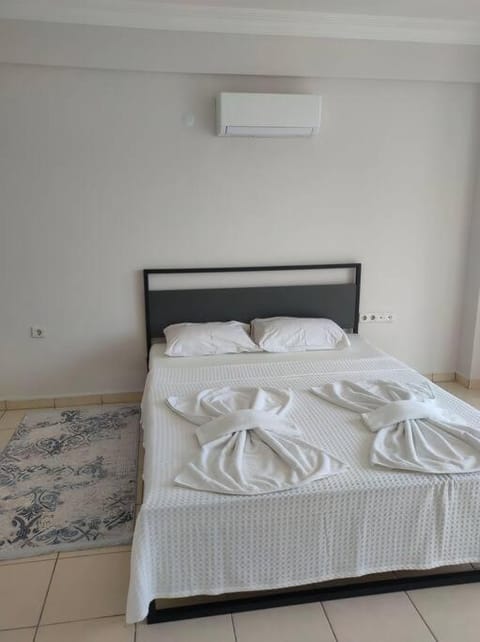 Bed, Bedroom, towels, air conditioner