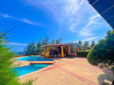 Day, Natural landscape, Beach, Pool view, Swimming pool, sunbed