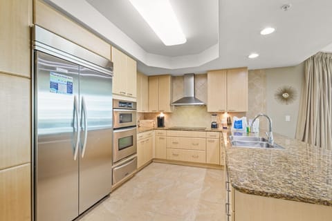 Kitchen or kitchenette, dishwasher, oven, stove, toaster