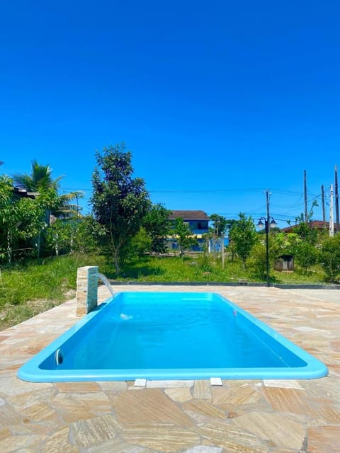 Apartamento em chácara próximo as praias com piscina e quiosque com internet Apartment in São Francisco do Sul