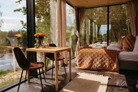 Bed, View (from property/room), Living room, Dining area, Bedroom, Garden view, River view