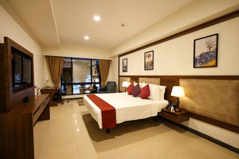 Bed, Living room, Seating area, Bedroom