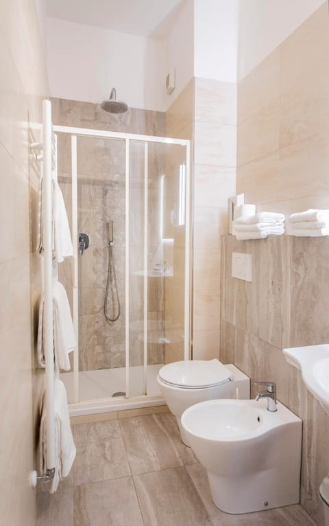 Shower, Bathroom, bidet, hair dryier, heating, towels