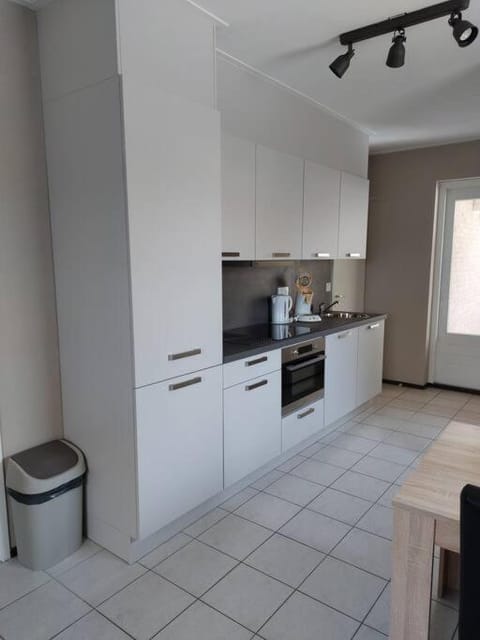 Kitchen or kitchenette, dishwasher, oven, stove, toaster