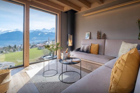 View (from property/room), Living room, Seating area, Mountain view, flat iron