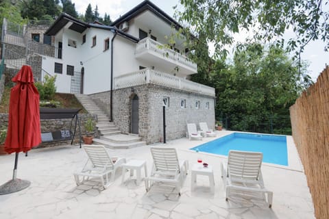 Property building, Patio, Swimming pool