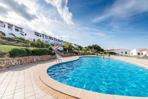 Lovely hideaway with pool and white sand beach Apartment in Arenal d'en Castell