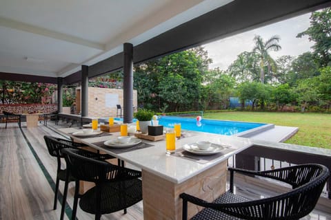 Sunshine Bloom by StayVista - Your Oasis with Pool, Lawn, Gazebo, and Poker Table Villa in Lonavla