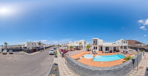 Property building, Natural landscape, Beach, Pool view, Sea view, Swimming pool, sunbed