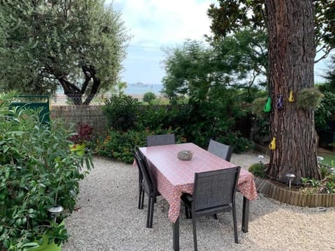 Patio, Natural landscape, Garden, Dining area, Garden view, Sea view