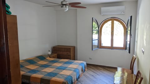 Bed, Photo of the whole room, Bedroom, fireplace, air conditioner