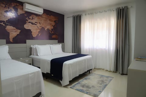 Bed, Photo of the whole room, Decorative detail, Bedroom, microwave, air conditioner