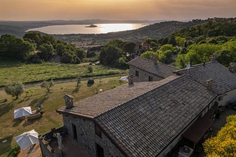 Property building, Nearby landmark, Day, Natural landscape, Bird's eye view, Seating area, Lake view, Sunrise, Sunset