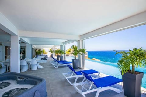 Balcony/Terrace, Seating area, Pool view, Sea view