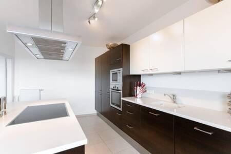 Kitchen or kitchenette, oven, stove