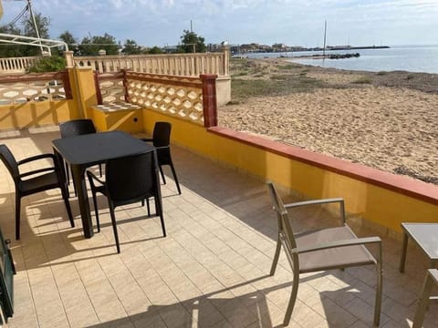 Property building, Patio, Day, View (from property/room), Dining area, Beach, Sea view