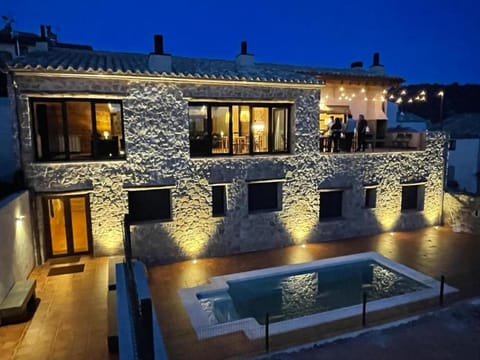 Property building, Patio, Night, Pool view, Swimming pool, sunbed