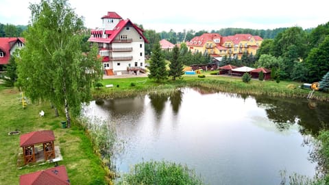 Property building, Nearby landmark, Day, Natural landscape, Bird's eye view, Lake view