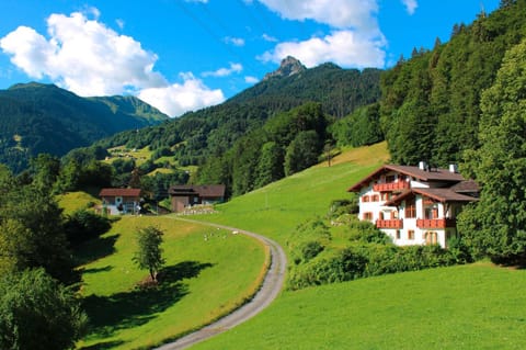Property building, Nearby landmark, Spring, Day, Natural landscape, Mountain view