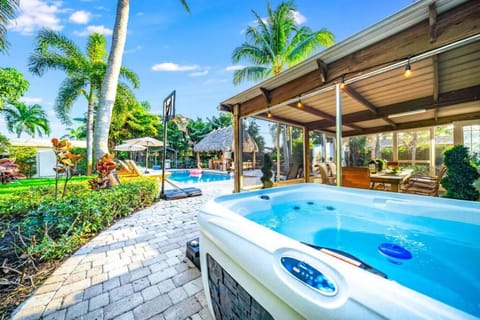 Chique Pool and Tiki Resort Haus in Pompano Beach