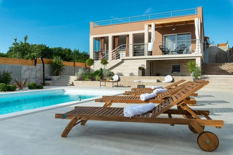 Property building, Patio, Swimming pool