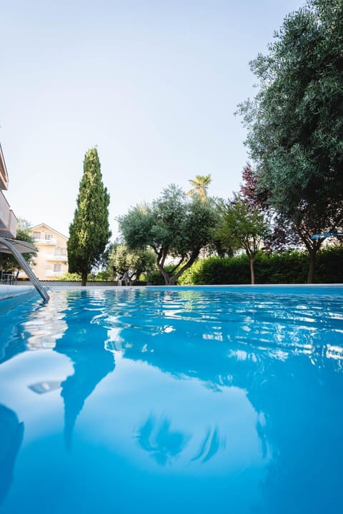 Property building, Garden, Pool view, Swimming pool