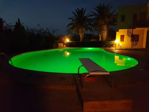 Property building, Night, Swimming pool