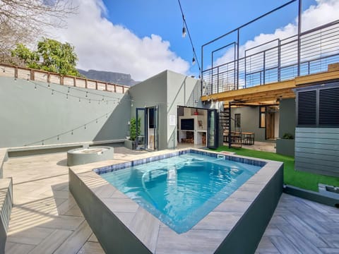 Property building, Patio, Day, BBQ facilities, Hot Tub, Mountain view, Pool view, Swimming pool, Swimming pool, sunbed