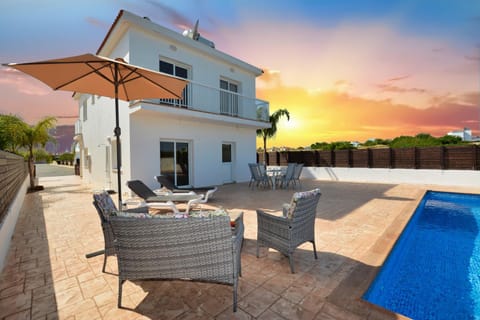 Property building, Patio, Swimming pool, Sunset