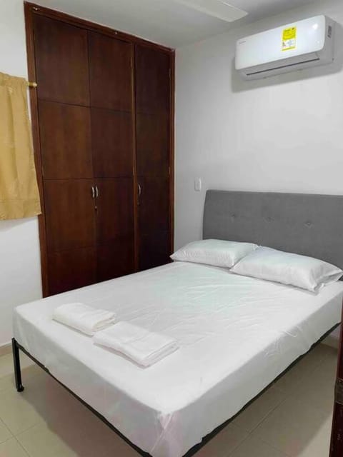 Bed, Photo of the whole room, Bedroom, towels, wardrobe, air conditioner