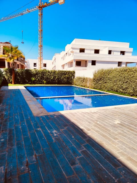 Property building, Day, Pool view, Swimming pool