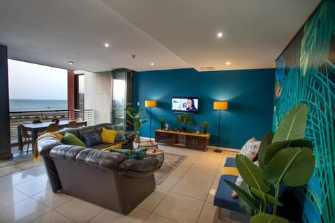 Stay at The Point - Kaleidoscopic Caribbean Cruise Apartment in Durban