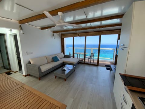 Natural landscape, TV and multimedia, Living room, Seating area, Sea view