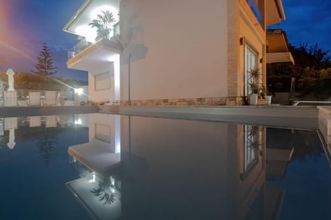 Property building, Night, Pool view, Swimming pool