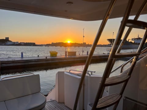 Tranquility Yachts -a 52ft Motor Yacht with waterfront views over Plymouth. Docked boat in Plymouth