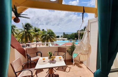 Patio, View (from property/room), Balcony/Terrace, Dining area, Pool view, Sea view, Swimming pool