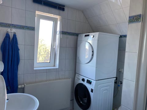 Bathroom, towels, washing machine, dryer