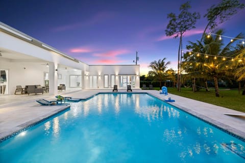 Property building, Day, Night, Pool view, Swimming pool, Swimming pool, sunbed