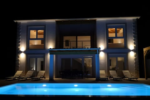 Property building, Night, Swimming pool