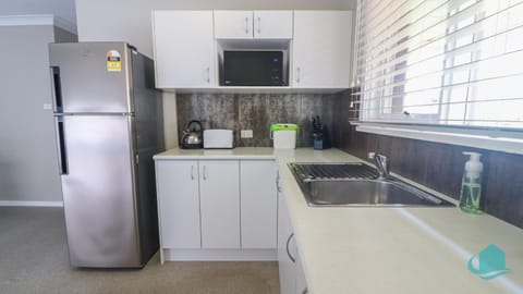 Kitchen or kitchenette, oven, stove