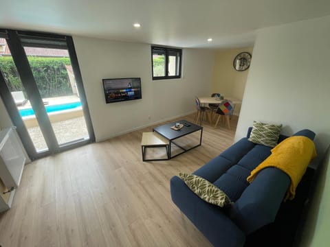 Living room, Seating area, Pool view