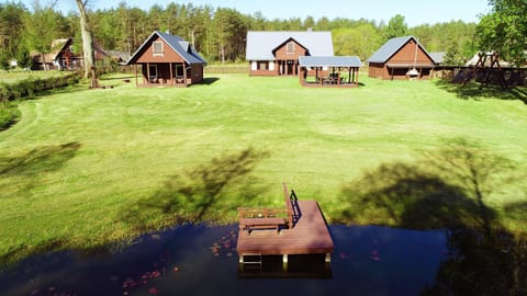 Property building, Patio, Facade/entrance, Day, Neighbourhood, Natural landscape, Bird's eye view, Garden, Beach, Garden view, Lake view, River view