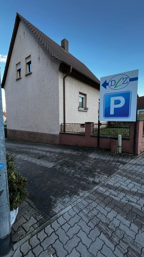 Day, Property logo or sign, Street view, Parking