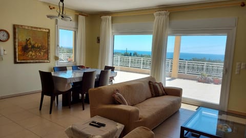 View (from property/room), Balcony/Terrace, Living room, Seating area, Dining area, Sea view