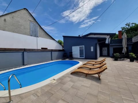 Property building, Patio, Swimming pool