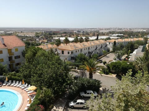 Property building, City view, Pool view, Street view, Parking