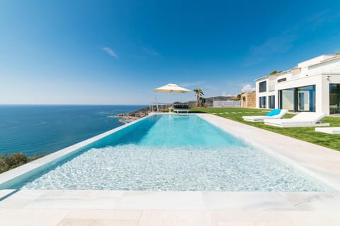 Property building, Day, Natural landscape, Pool view, Sea view, Swimming pool, sunbed