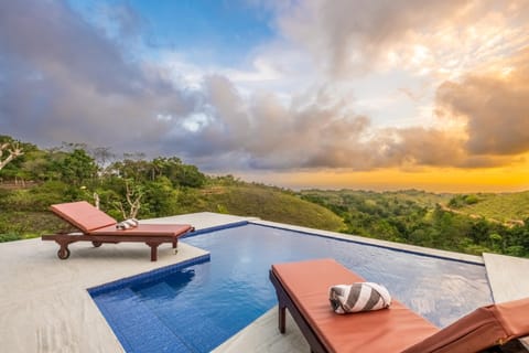 View (from property/room), Mountain view, Pool view, Swimming pool, Sunset, sunbed