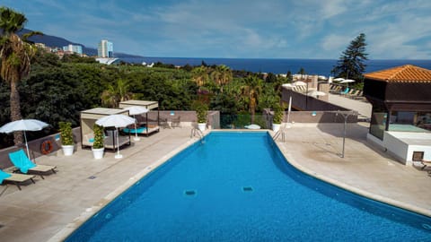 View (from property/room), Pool view, Sea view, Swimming pool, sunbed